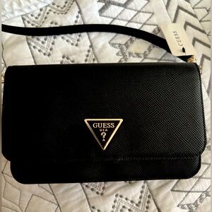 GUESS - black leather shoulder bag with adjustable strap. brand new